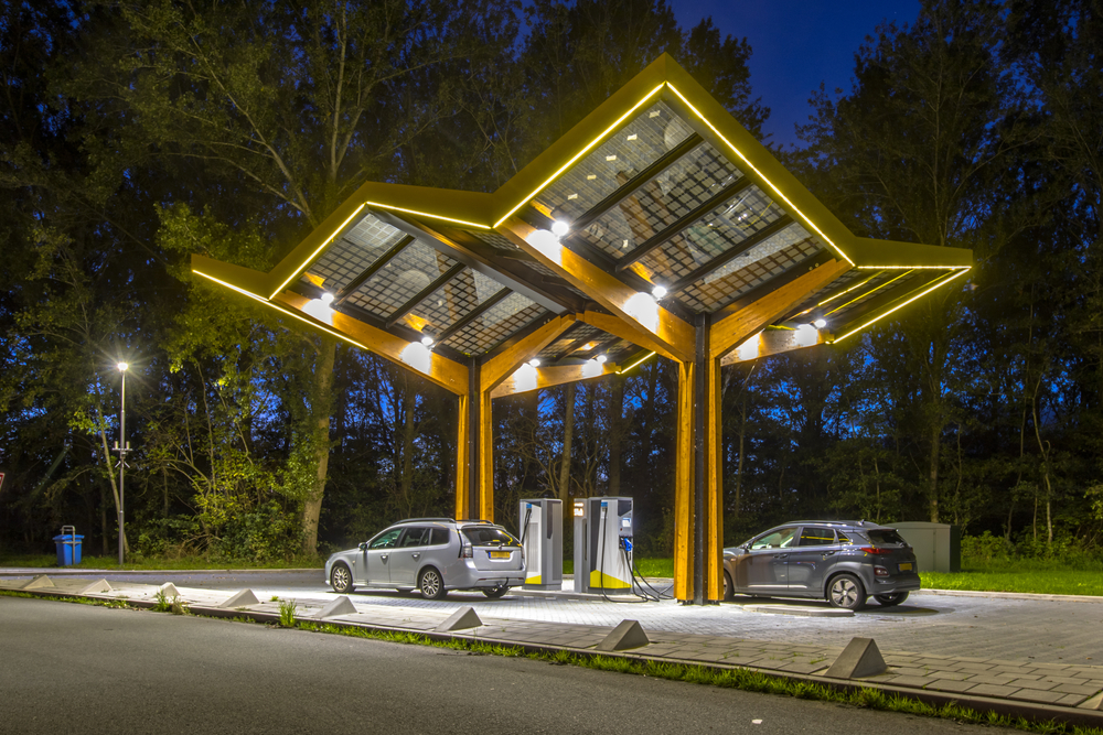 Electric,Cars,Charging,At,Electricity,Filling,Station,In,The,Fast